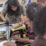 An Asylum Seeker is learning sewing